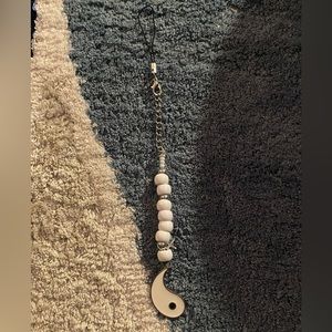 White hand made keychain